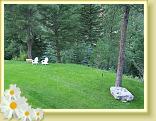 The Wilderness Gateway Bed and Breakfast guest lawn in the summer